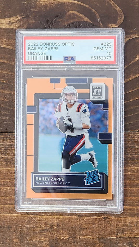 2022 Donruss Optic Bailey Zappe Orange Rated Rookie /199 PSA 10